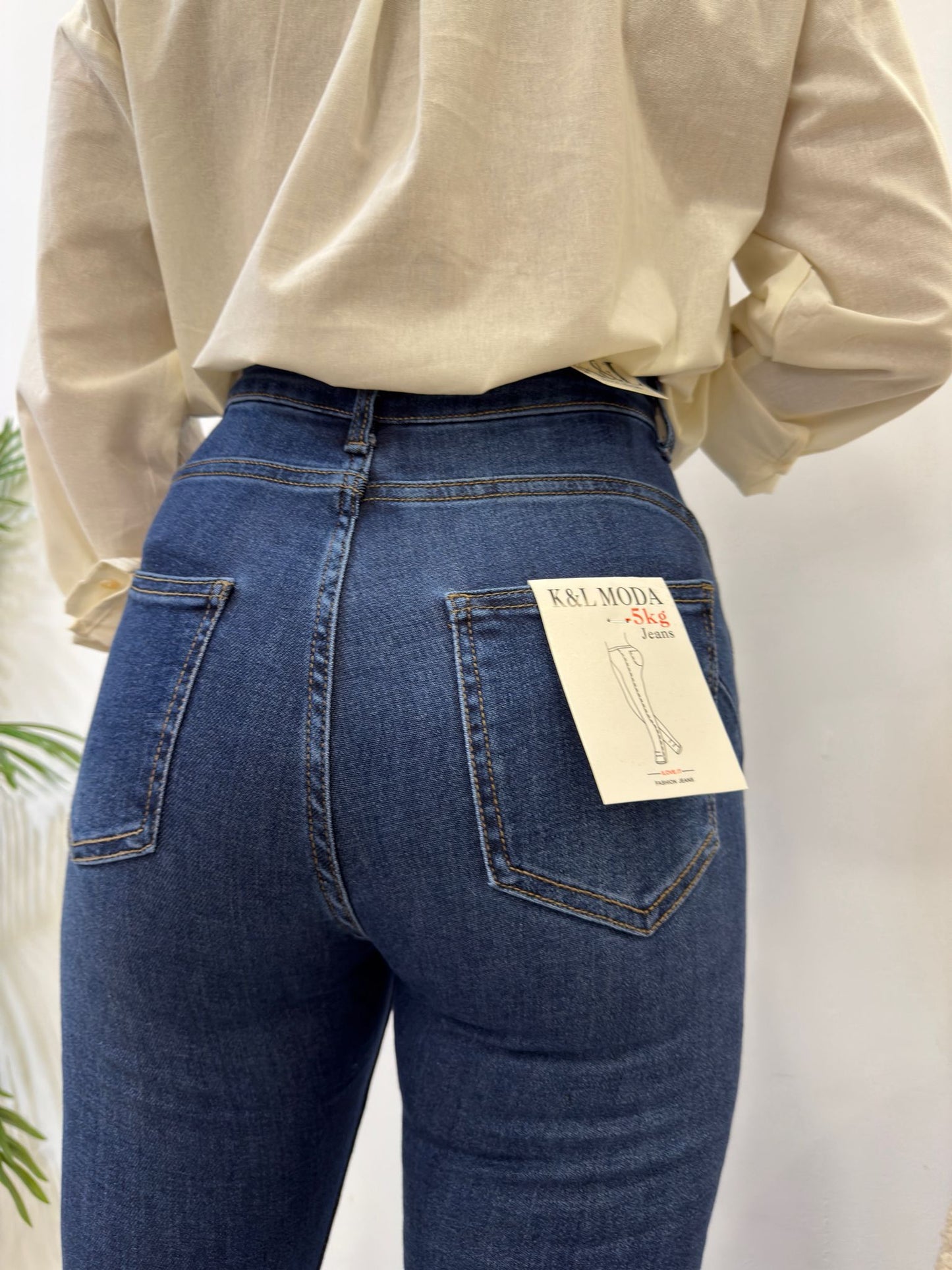 JEANS BAJO CAMPANA DESFLECADO